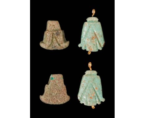 Ca. 664 - 30 BC.A pair of glazed faience lotus flower amulets, each with a flat form and incised petal details. Both amulets 