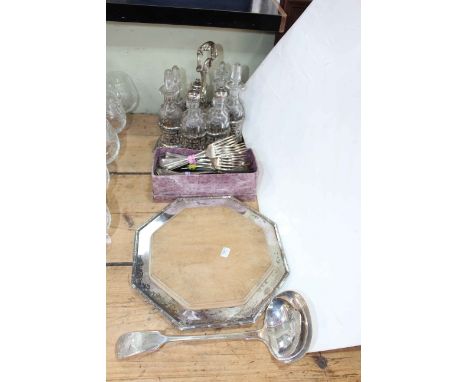Seven bottle cruet set with three silver collared bottles, EPNS belt, ladle, etc.