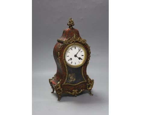 A French scarlet boulle work mantel clock, 29cm high