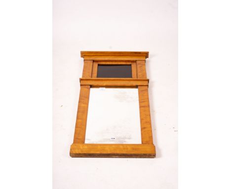 A Biedermeier style maple wall mirror, width 52cm, height 109cm