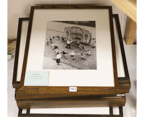 A collection of modern black and white photographs: Henk Jonker, Children and organ grinder, Roger Mayne, Please Mr Take My P