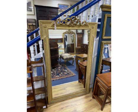 A gilt overmantel mirror, width 94cm, height 152cm