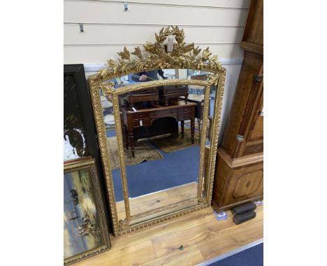 A 19th century giltwood and gesso overmantel mirror with Olympic Torch &amp; Laurel Crown, side cushions with decorated bead 