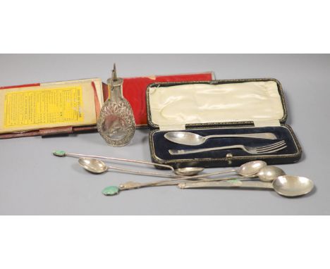 A modern silver spoon by Amy Sandheim (a.f.), a cased silver christening pair, a mounted bridge pad and Chinese cocktail spoo