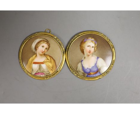 A pair of 19th century German porcelain circular portrait plaques, 7cm diameter