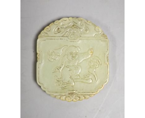 A Chinese pale celadon jade plaque, boy and bats, 5cm wide