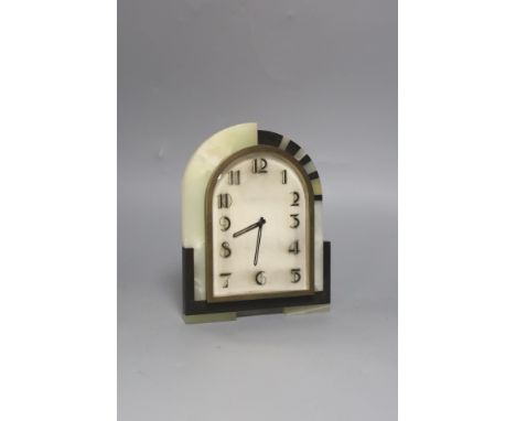 An Art Deco black marble and pale green mantel clock, 19cm high