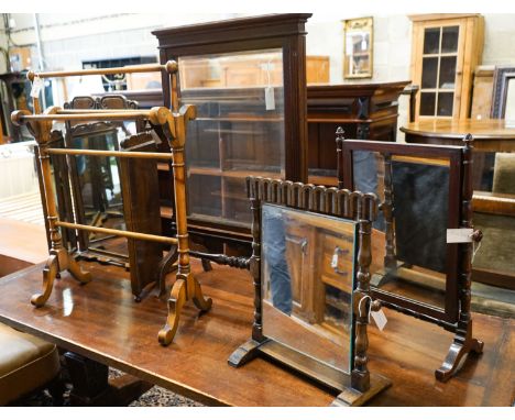 An oak triple mirror, a towel rail, an oak firescreen and two toilet mirrors