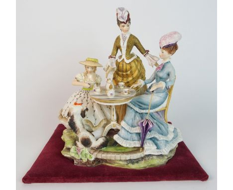 A Royal Worcester figure group 'The Tea Party' modelled by Ruth Esther Van Ruyckeuelt one of the Victorian series modelled as