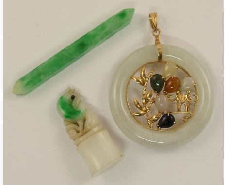 A 14ct mounted multi-colour Chinese green hardstone pendant of rondel shape and a white and green Chinese green hardstone car