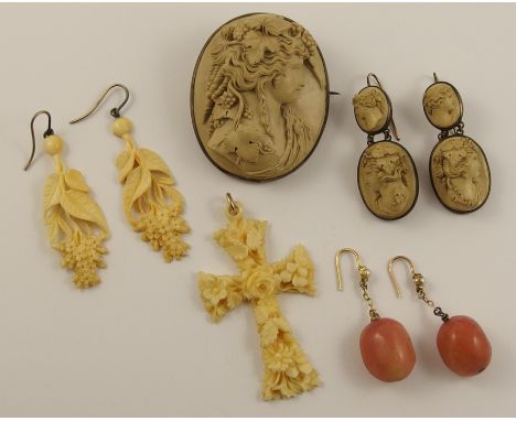 A collection of Victorian jewellery to include a lava brooch with matching earrings depicting maidens, a flower carved ivory 