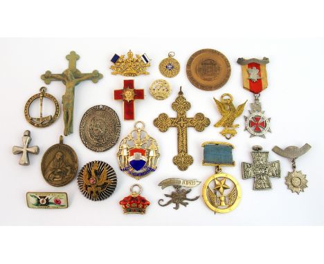 A mixed collection of Masonic and Society medals and badges a silver, gilt and enamel cross with radiating human face a Grand