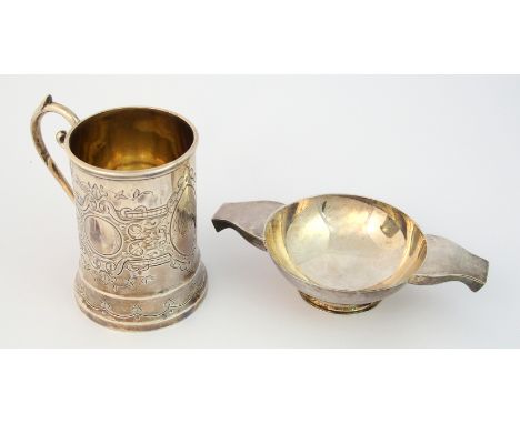 A silver quaich maker's marks L & R Birmingham 1933, of classic shape with down-turned lugs (8cm diameter), also a silver chr