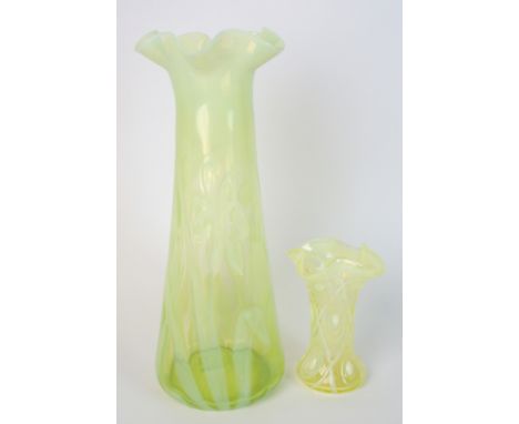 A Victorian Art Nouveau vaseline glass vase decorated with stylised iris flowers on a pale green ground, 34cm high, to includ