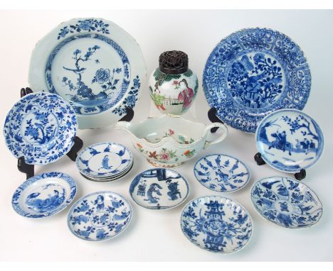 A Chinese export famille rose sauce boat painted with flowers (damages), Qianlong, 21cm wide, famille rose jar with wood cove