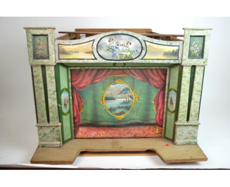 A Victorian wood and painted puppet theatre with additional painted scenery and figures, 51 x 43cm