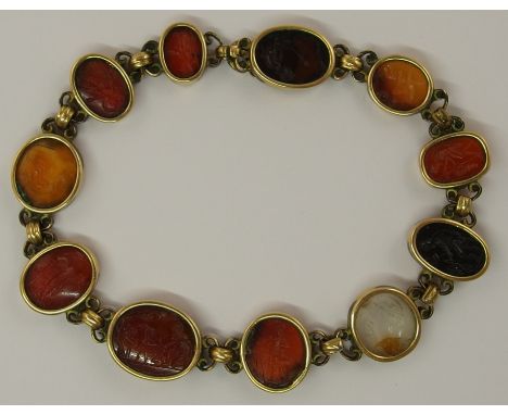 A bracelet set with intaglios each of the eleven intaglios is carved with a different classical theme, set throughout in yell