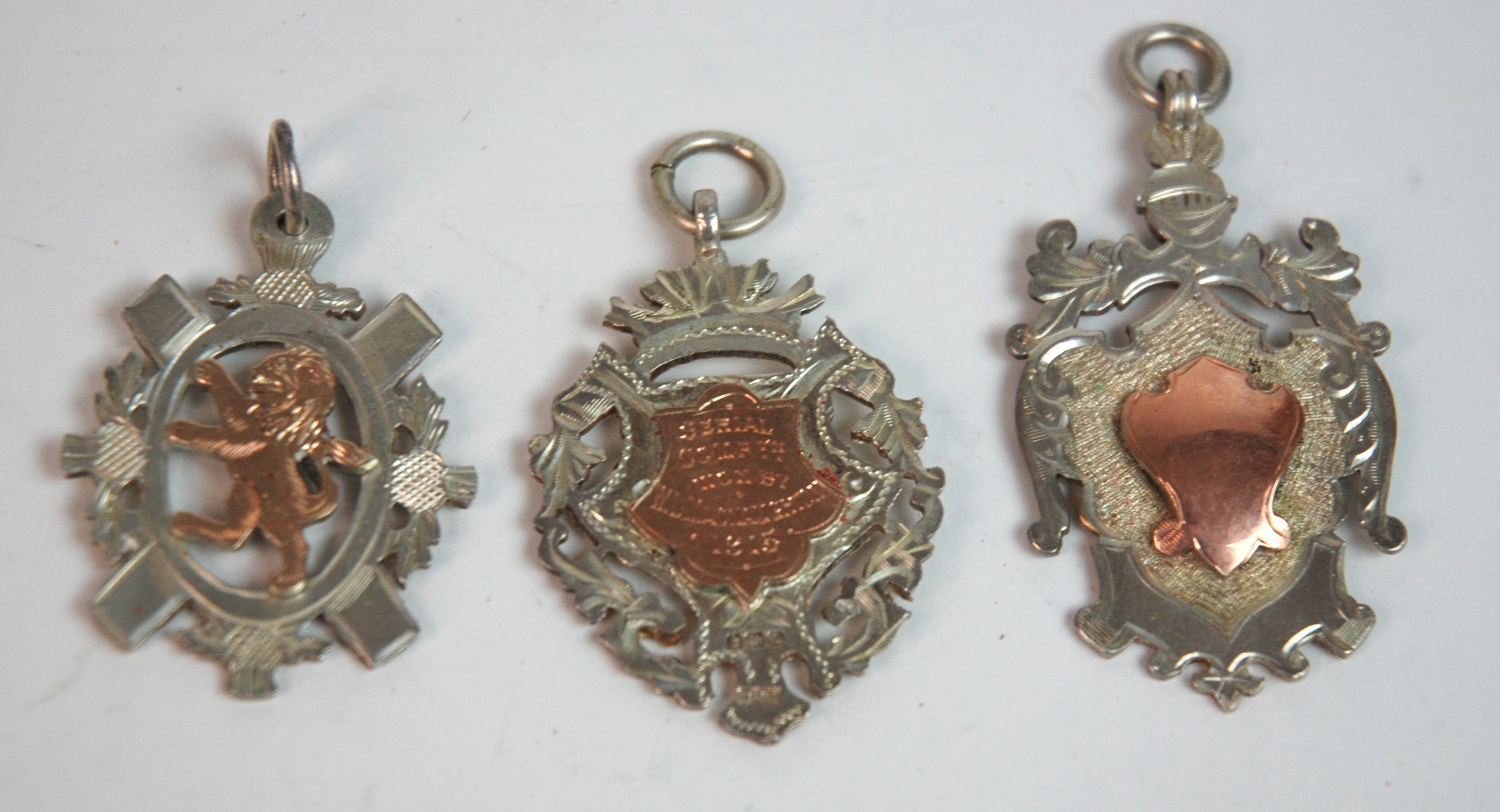 Five various silver rifle medals including Scottish Rifle Association