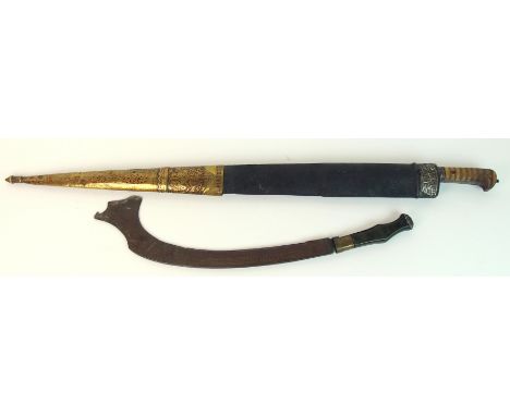 A Malaysian axe with metal mounted shaped horn handle and curving engraved blade, 55cm overall length with an Indian sword wi
