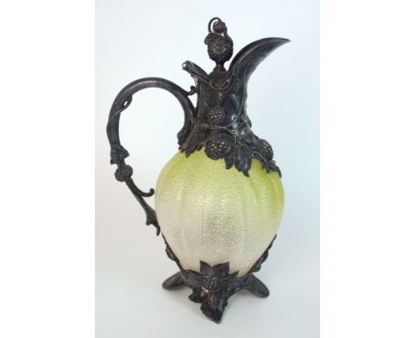 A late Victorian claret decanter the Britannia metal mounts decorated with raised blackberries, a blackberry finial mounted l