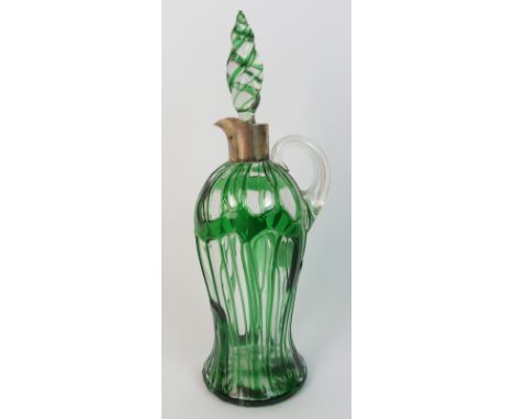 A Victorian trailed glass silver Hukin and Heath mounted claret decanter the body decorated with trailed green glass, the sto