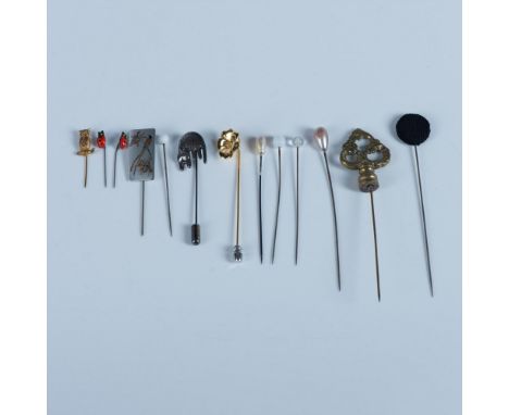 Different sizes and shapes and finishes. Ladybug, flower, bird, owl, cat and finial stick pins. Assorted pearl and button hat