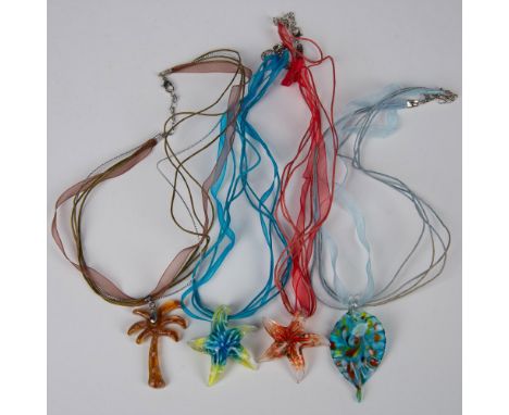 This colorful group consists of two starfish, a leaf and a palm tree. Each with a unique design and pattern. Each on a coordi