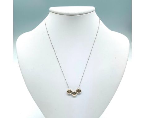 14k white gold chain with three cute sterling silver monogrammed beads that read T &amp; Co. when strung together. Dimensions