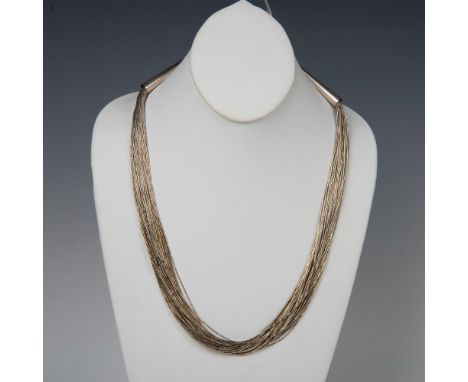 Fabulous multi strand mini bugle bead sterling silver necklace. The ends are 3" long cone shaped sterling silver tubes with a