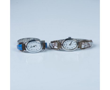 Two identical watches with stone inlay on sterling silver. One is blue lapis and the other is brown and white crazy horse. Bo