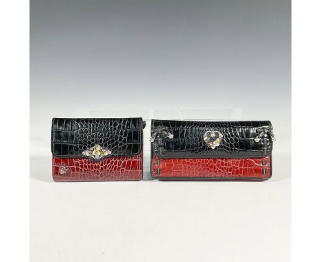 Two tone black and burgundy leather with silver floral design on long organizer with shoulder strap and wallet with coin purs
