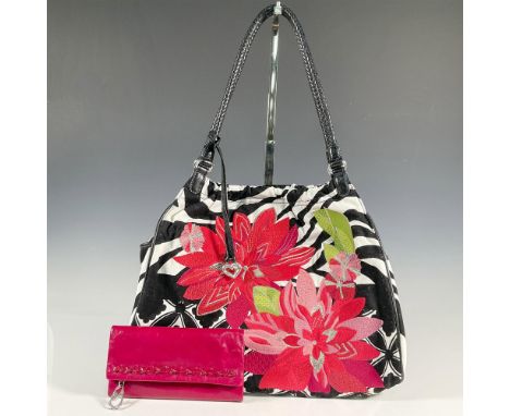 Black and white canvas handbag with large pink flowers, interior pockets, magnetic closure, leather straps; 16"L x 4"W x 13"H