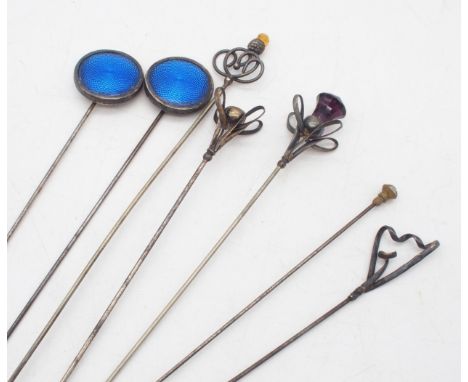 A selection of white metal and silver hat pins, one twisting example by&nbsp;S Ward &amp; Sons, Chester 1908, two circular bl