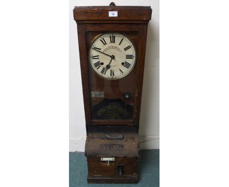 An early 20th century oak cased "National Time Recorder Co Ltd" clocking machine, 106cm high x 35cm wide x 32cm deep Conditio