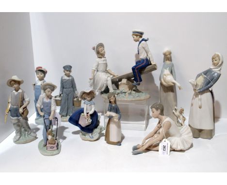 Nine Lladro figures of children and a Nao figure of a ballerina Condition Report:see saw figure damaged and girl holding goos