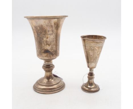 A silver goblet, on a footed circular base, with a knopped capstan stem, with presentational inscription, by&nbsp;Aaron Lufki
