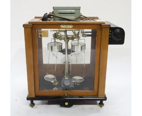 A Stanton Instruments set of Model A.D.2 pharmaceutical balance scales, housed in a glazed mahogany case Condition Report:Ava