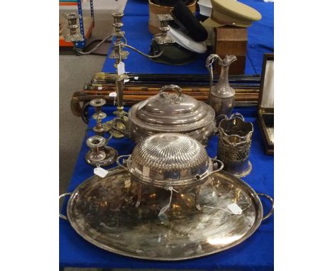 A collection of EPNS including a large soup tureen, with moulded scrolling foliate feet and handles, an EPNS ewer, a rollover