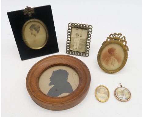 Assorted miniature portraits, comprising a silhouette profile of a bearded man in circular oak frame, photographic portrait i