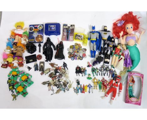 A collection of 1980s, 90s and later toys, to include Star Wars, Batman, Power Rangers, Trolls/Gonks, Disney, Tazos, Thunderb