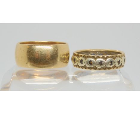 A 9ct wide wedding ring size T1/2, 9ct gem set eternity ring, size R, weight together 11.7gms Condition Report:Available upon