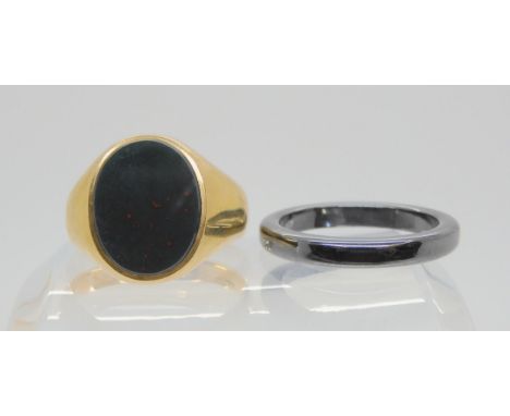 A heavy gents bloodstone signet ring by Payton, Pepper &amp; Co Ltd, size R, weight 7.4gms, together with a hematite ring siz