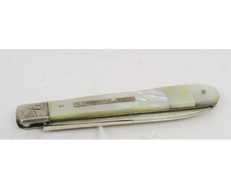 A Victorian silver and mother of pearl fruit knife, the handle with a blank rectangular cartouche, the blade hinge initialled