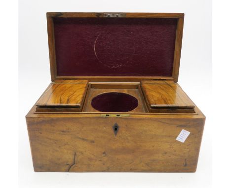 A solid walnut tea caddy, of plain form, with burgundy Morocco leather-lined interior Condition Report:Available upon request