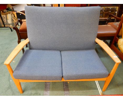 A mid 20th century teak framed Parker Knoll two seater sofa with blue upholstery, 90cm high x 119cm wide x 85cm deep Conditio