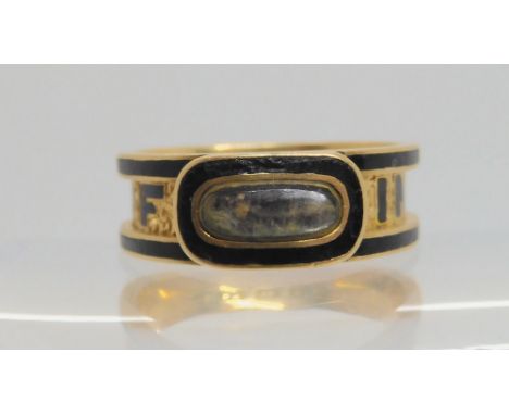 A Victorian 18ct gold mourning ring, with black enamel and locket panel, (no personal inscription) Nice clear hallmarks for B