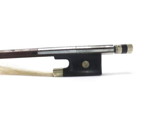 Nickel and abalone mounted violin bow, the stick round, the handle overlaid with abalone, the frog inlaid with pearl eyes and