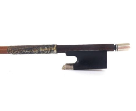 Silver mounted violin bow stamped Piernot á Paris, the stick round, the ebony frog plain and with a silver overlaid ebony adj