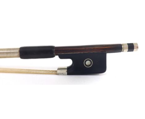 French nickel mounted violin bow stamped Cuniot-Hury, the stick round, the ebony frog inlaid with silver rings enclosing pear