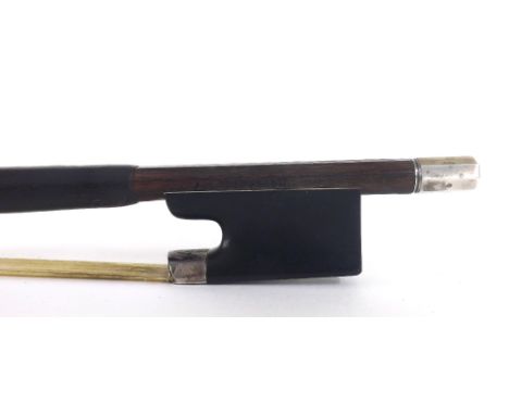 German silver mounted violin bow stamped Aug. Edwin Prager, the stick round, the ebony frog plain and with a silver overlaid 